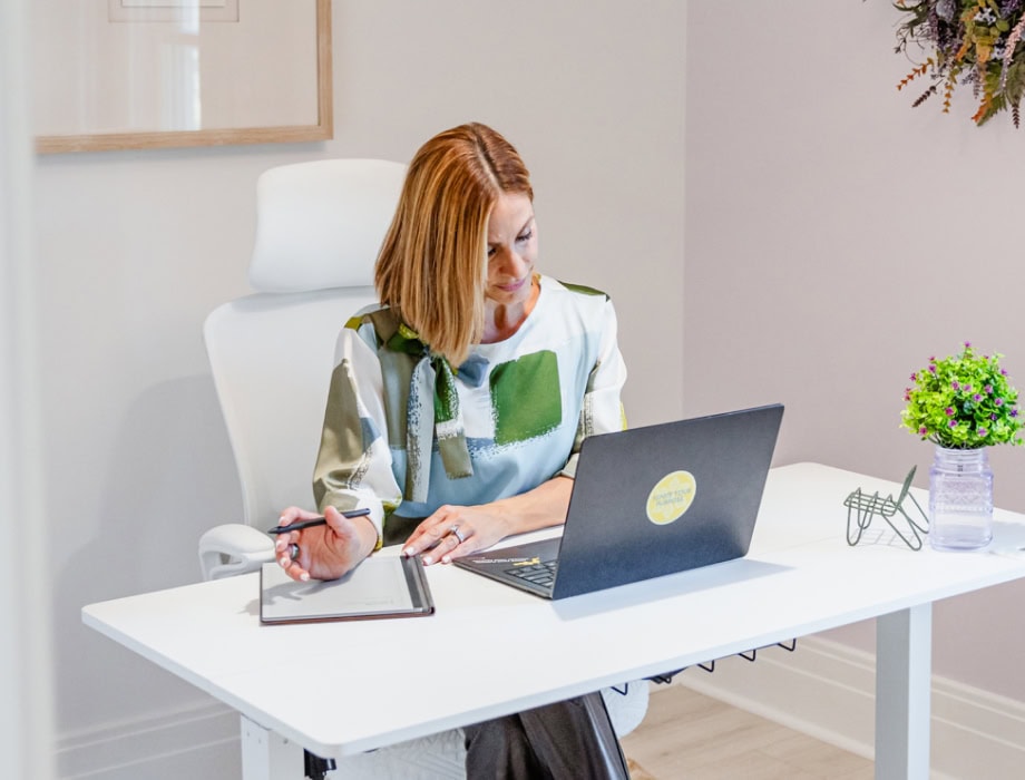 A woman working on her laptop